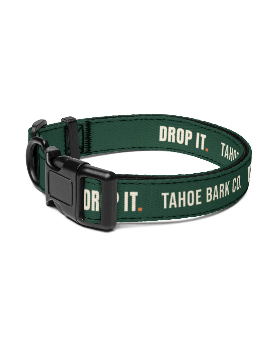 The Drop It. Drop It. Drop It. collar laid flat: TAHOE BARK CO. and DROP IT. in cream on the pine strap beside the black plastic buckle.