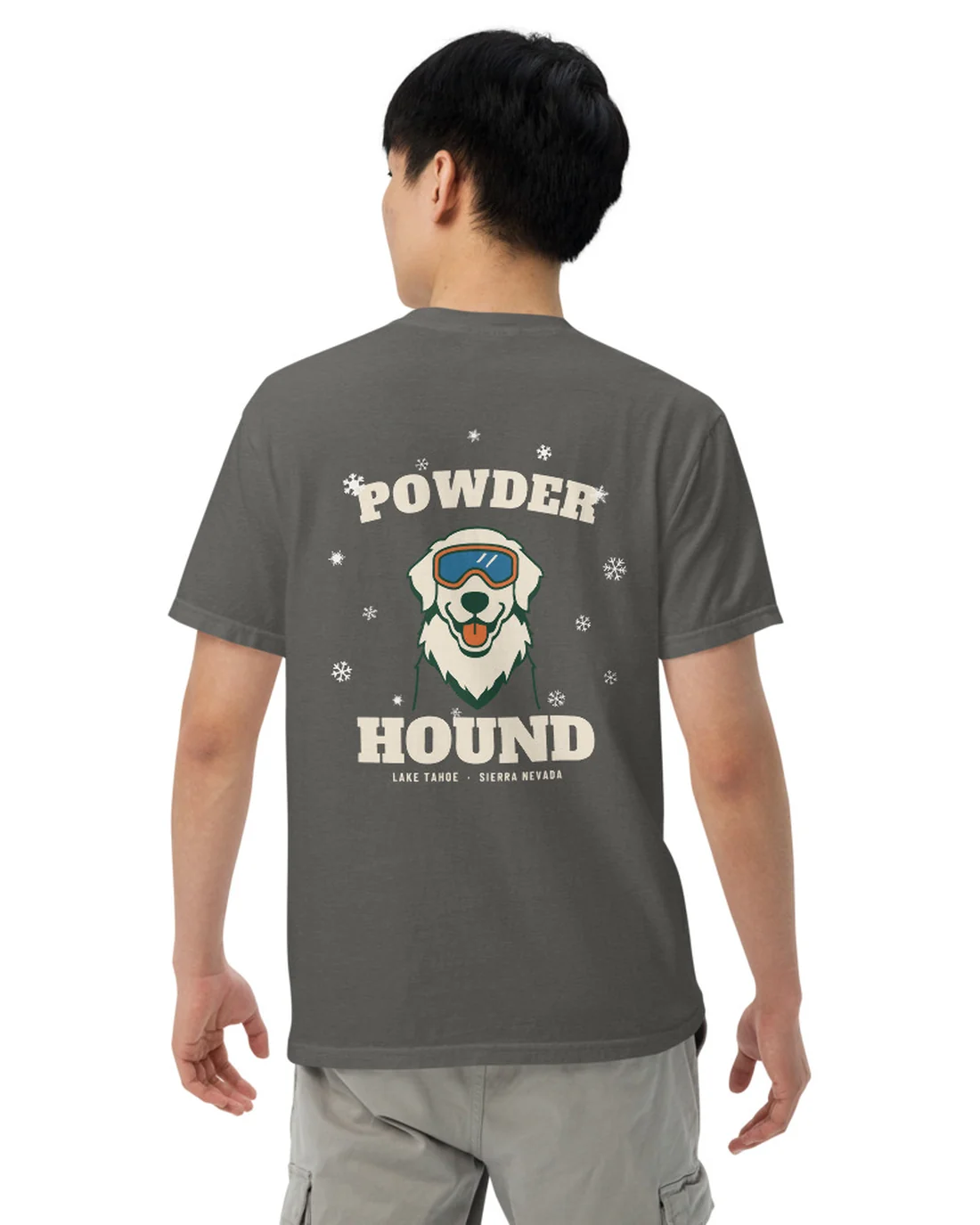 The Powder Hound design on a tee, worn by a model, from the back.