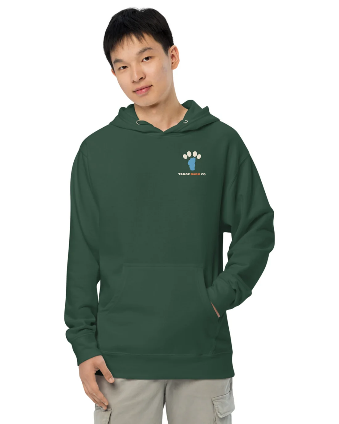 The front of the Ruff Day at the Lake hoodie, worn by a second model, with the Tahoe Bark Co. logo at the heart.