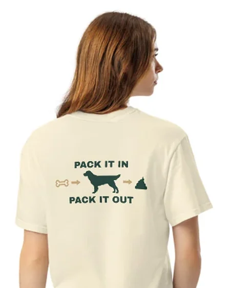 The Pack It In, Pack It Out design on a tee, worn by a model, from the back.