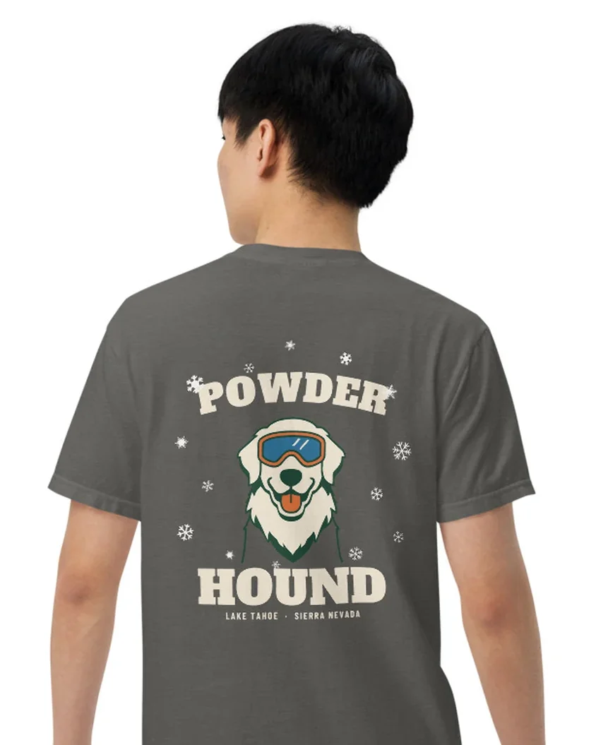 The Powder Hound design on a tee, worn by a model, from the back.