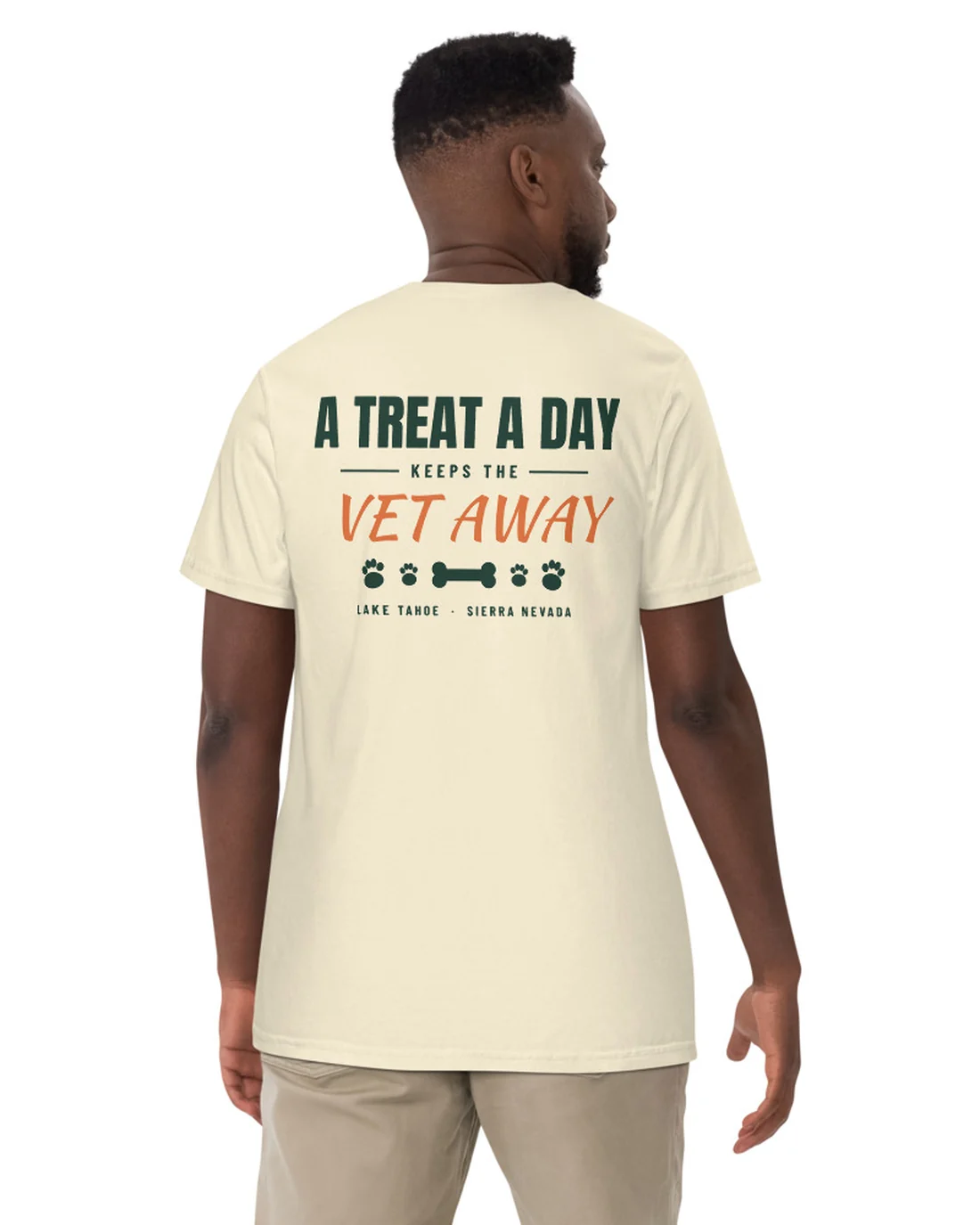 The A Treat A Day design on a tee, worn by a model, from the back.