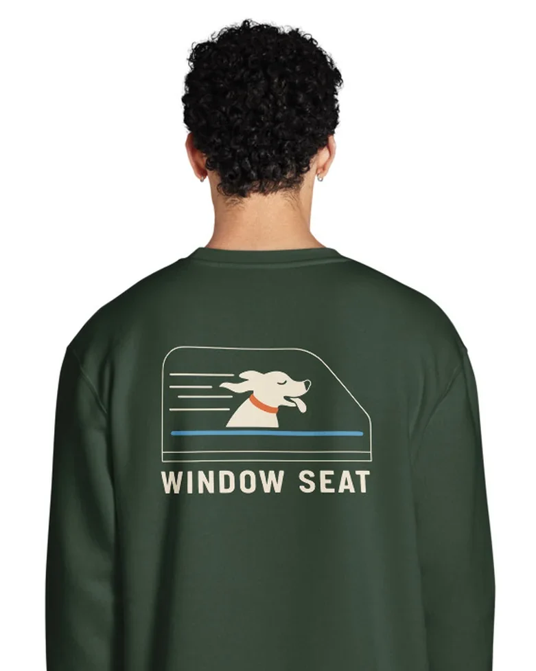 The Window Seat design on a crewneck, worn by a model, from the back.