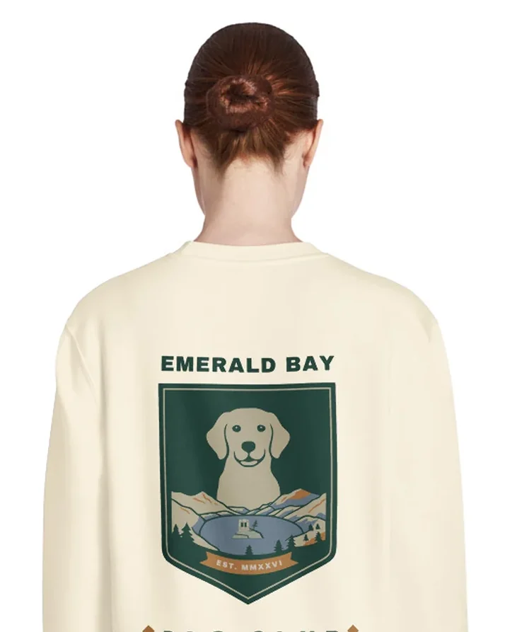 The Emerald Bay Dog Club design on a crewneck, worn by a model, from the back.