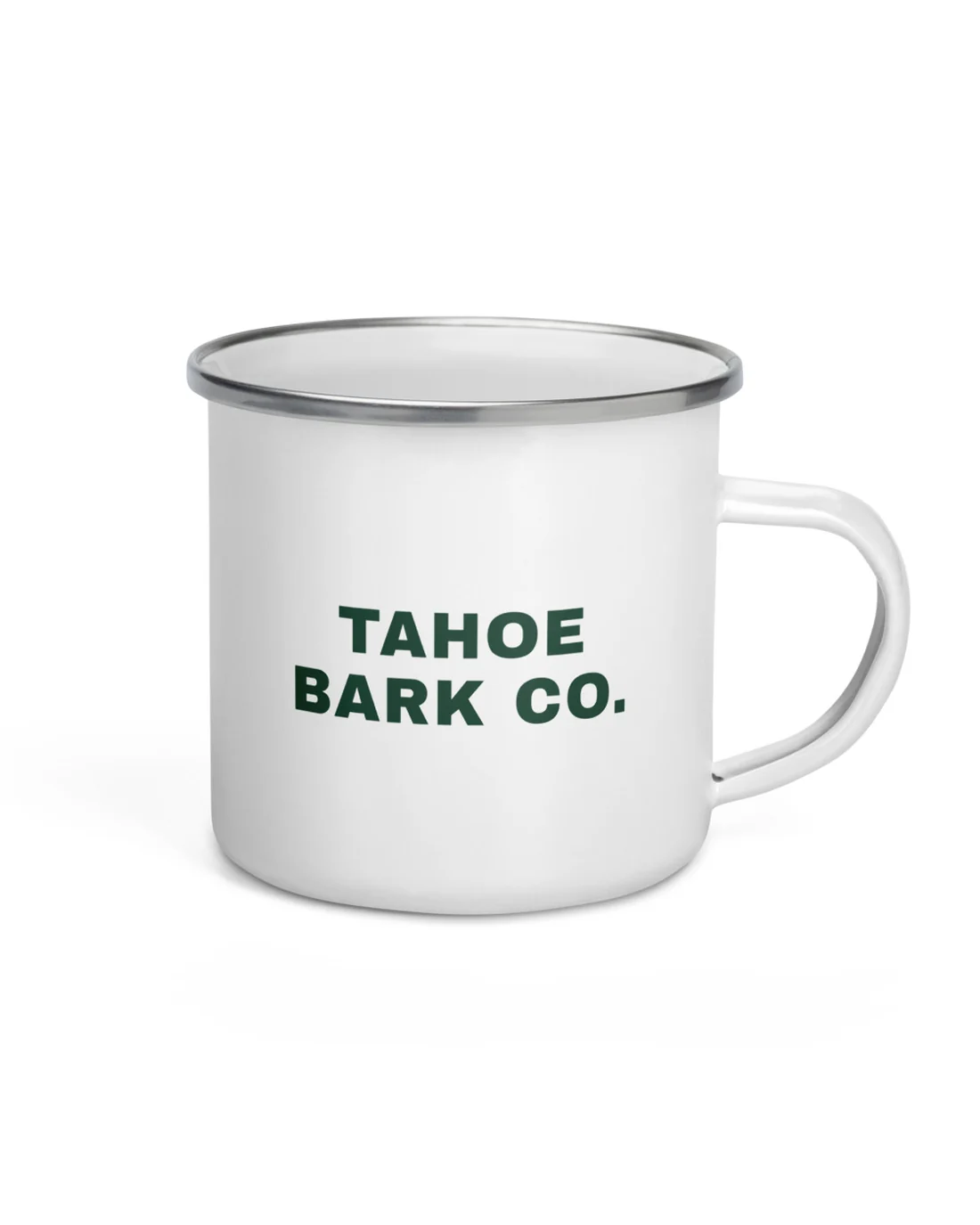 The other side of the 5:45 enamel camp mug: TAHOE BARK CO. in pine on two lines on white enamel, the handle on the right.
