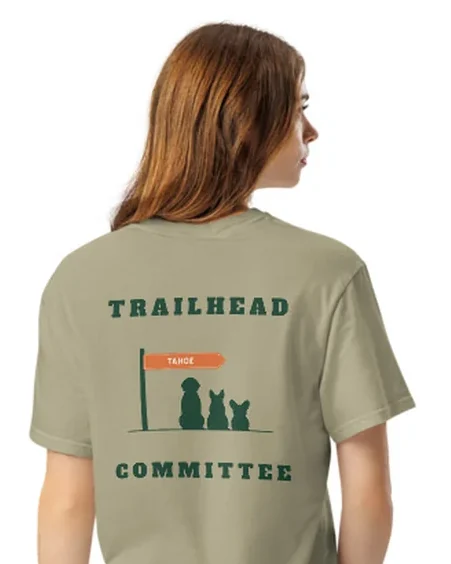 The Trailhead Committee design on a tee, worn by a model, from the back.